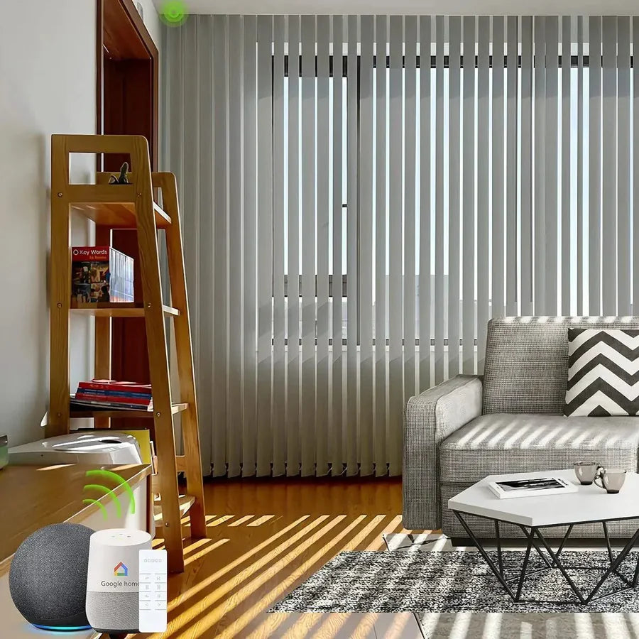 V smoky grey motorised vertical blinds installed in a living room, providing privacy and light control.