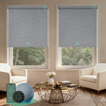 Motorised blockout roller blinds from the V-Series in v jungle grid light gray, providing full light blackout and smart control for a calm living room