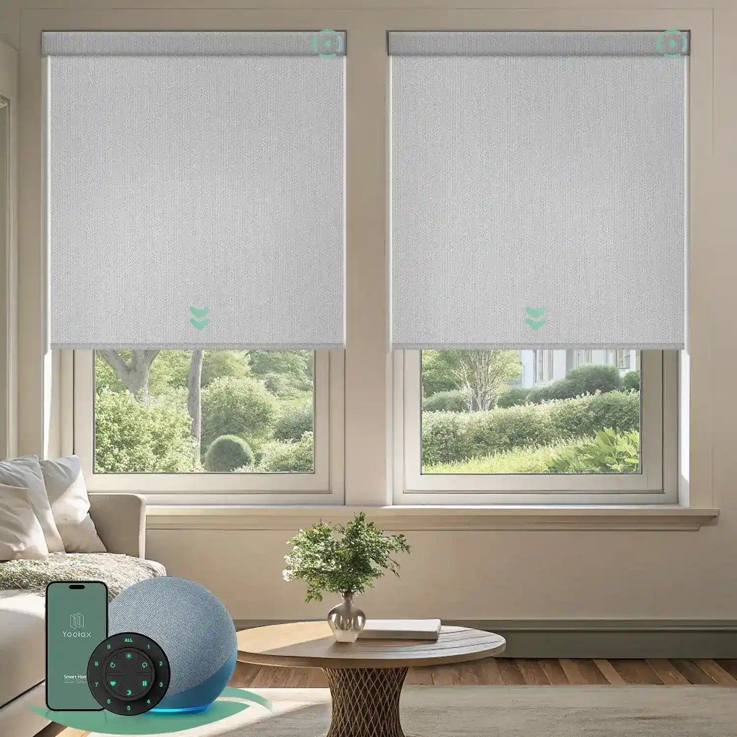 Motorised blockout roller blinds in fabric greyish white fabric, installed in a living room, offering soft daylight privacy with smart app and remote control.