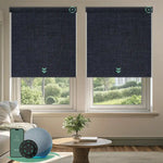 Motorised blockout roller blinds in fabric navy blue fabric, installed in a living room, offering soft daylight privacy with smart app and remote control.
