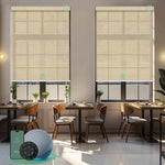 Motorised sunscreen roller blinds with 5% openness in mesh beige fabric, filtering daylight while maintaining outdoor views and privacy
