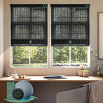 Motorised light filtering roman blinds with sheer black fabric, softly diffusing daylight while maintaining privacy
