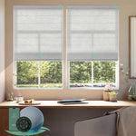 Motorised light filtering roman blinds with sheer light gray fabric, softly diffusing daylight while maintaining privacy