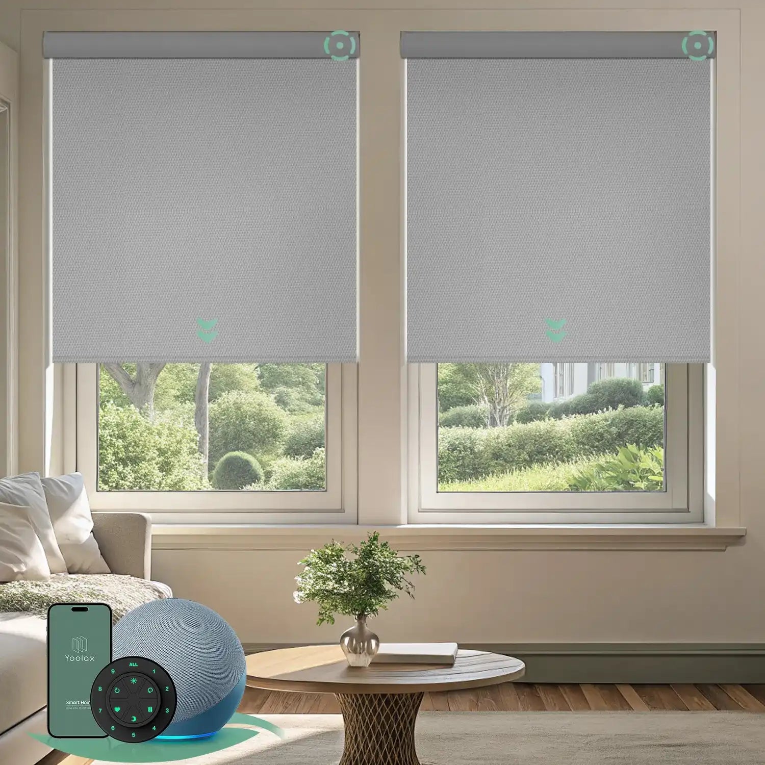 Light grey motorised vinyl blockout roller blinds installed in a living room, offering full blackout, privacy, and quiet smart control