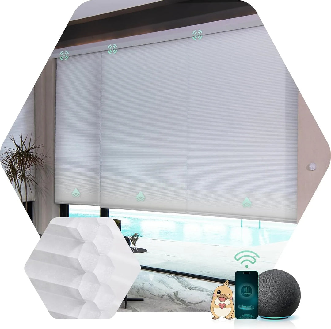Double-cell half-shading white motorised honeycomb blinds in a room with a pool view, offering light filtering.