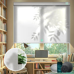 Pure white motorised light filter roller blinds in the dining room, offering light filtering.