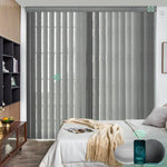 S-snowy night color motorised veri shades are installed in the living room, providing privacy and light control.